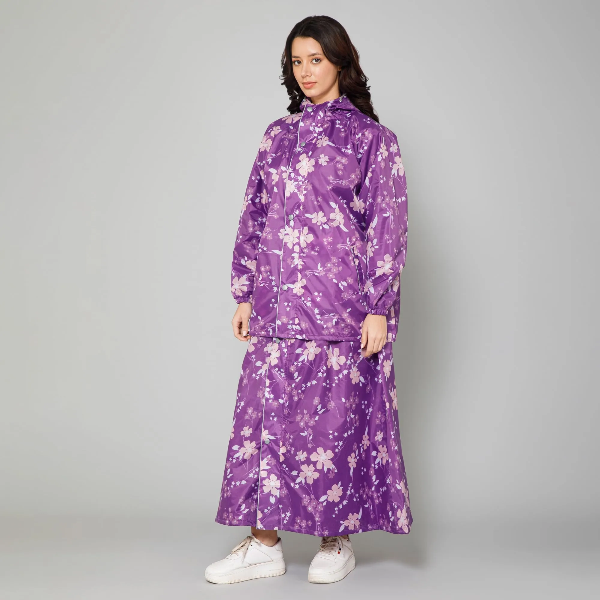 THE CLOWNFISH Polyester Waterproof Rain Coat For Women Skirt and Top Raincoat With Adjustable Hood and Front Pockets Rain Glam Series (Purple Floral, XX-Large)